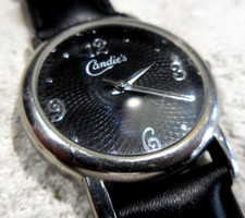 CANDIE'S, ANCIENNE MONTRE US SEVENTIES DAME,CADRAN A DECO ROSACE,B FONCTIONS