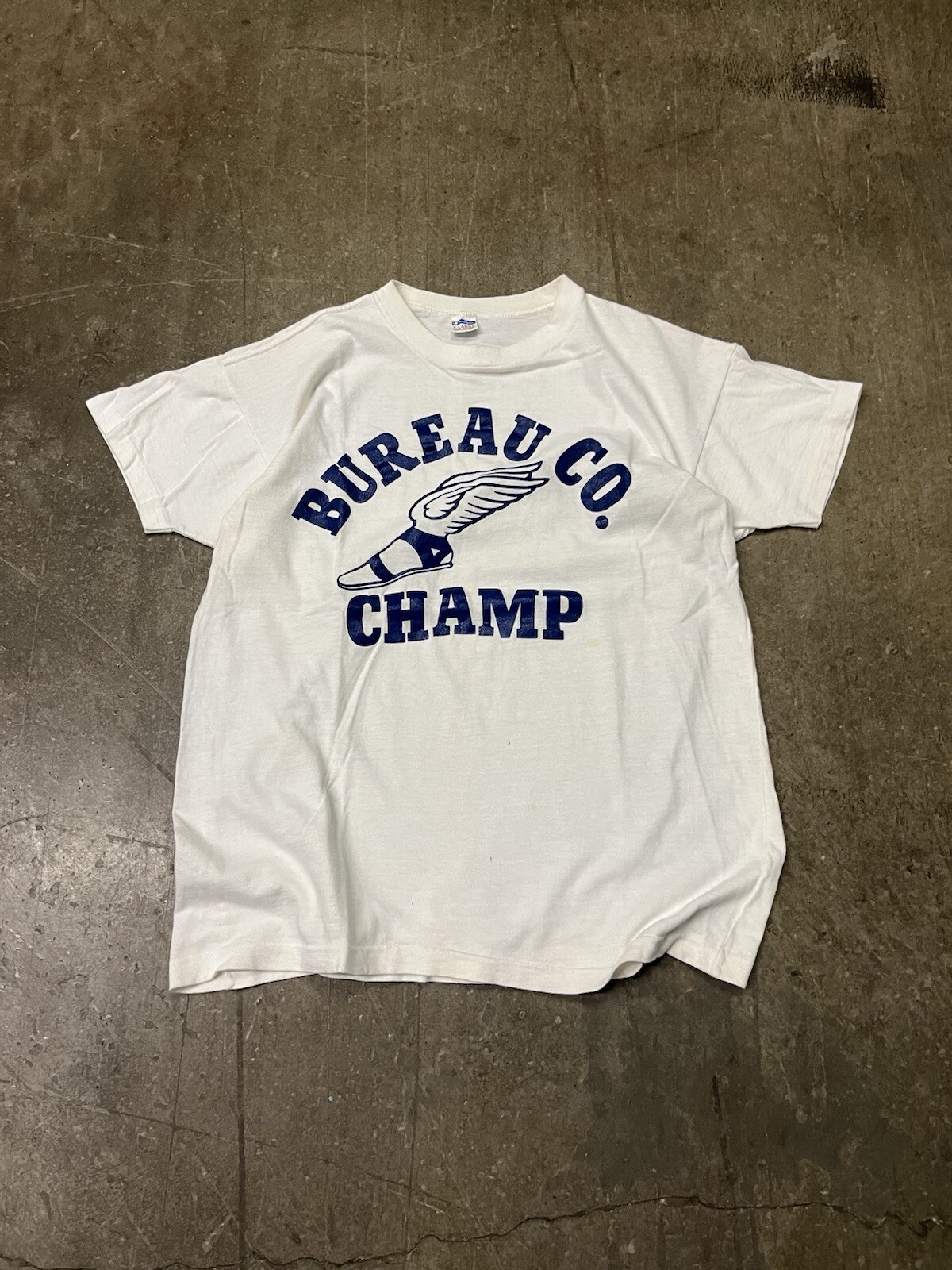 Camisa de correr Champion vintage años 70 EE. UU. Single Stitch Bureau Co. Champs