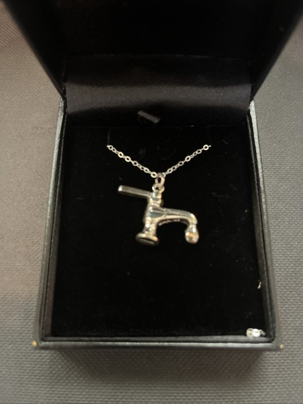 Farrah Fawcett Sterling Silver Faucet Pendant
