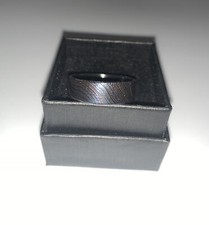 Damascus Steel Wedding Band With Carbon Fiber Inlay.