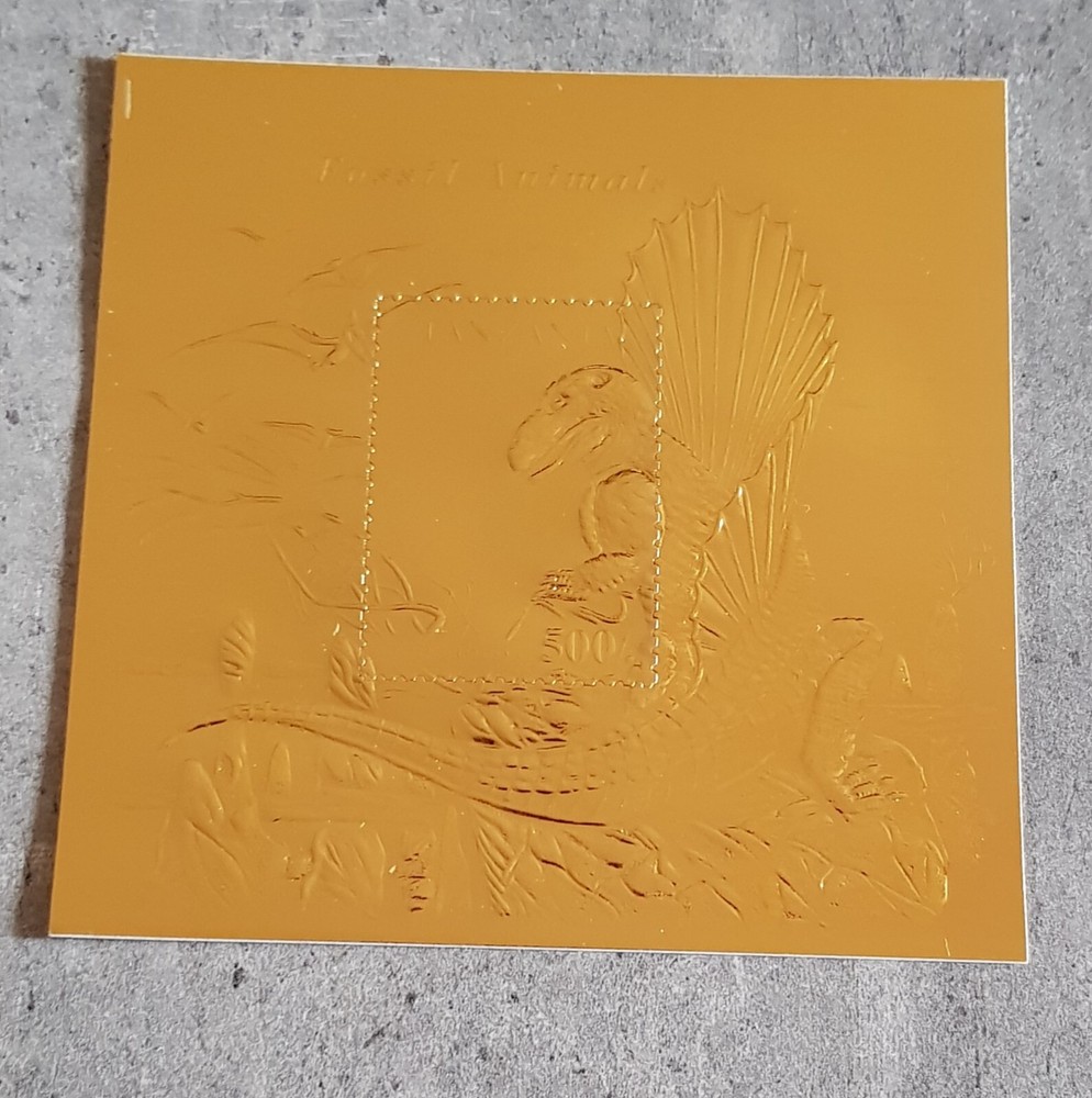 TANZANIA PREHISTORIC ANIMALS DINOSAURS BLOCK FOIL GOLD