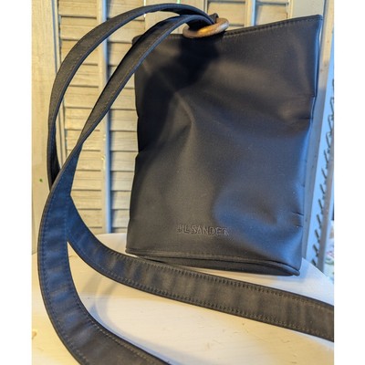 Jil Sander black nylon ring-closure cross-body bucket bag