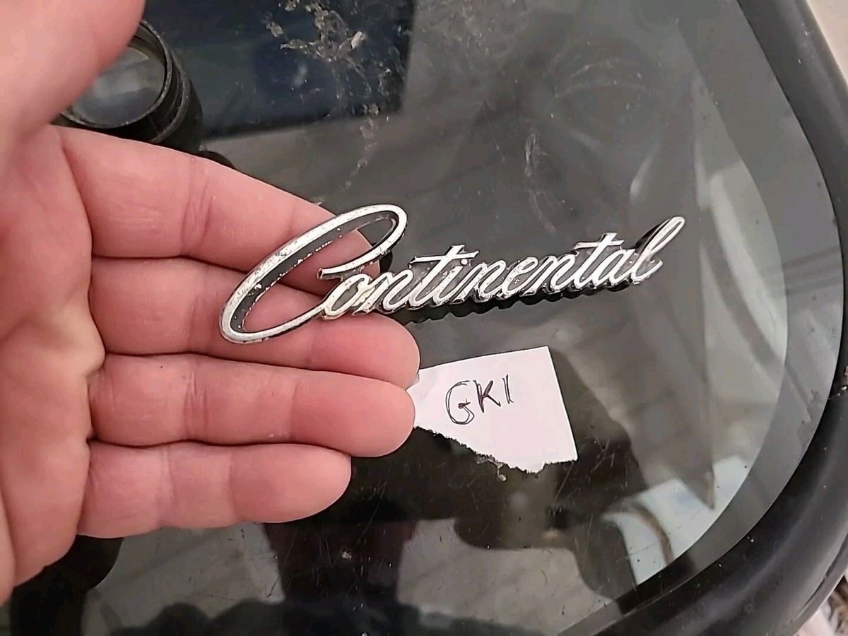VINTAGE 1972-75 LINCOLN CONTINENTAL HEADLIGHT DOOR EMBLEM OEM D2LB