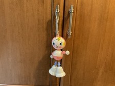 VTG CELLULOID STRUNG HANGING CRIB TOY/RATTLE W/PAINTED FACE BELL FEET, HONG KONG