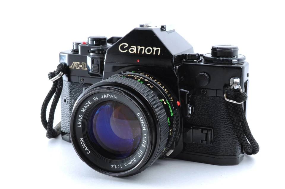 Lente extra 15 % de descuento [Exc+5] Canon A-1 SLR 35 mm NFD 50 mm f/1,4 JAPÓN Foto 2 de 4