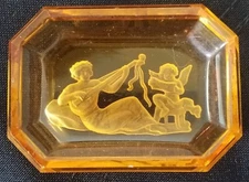 HEINRICH HOFFMAN AMBER GLASS RECTANGULAR INTAGLIO OPEN SALT CELLAR WOMAN MUSIC