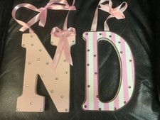1 pink Decorated wooden letter  N  or  D  1/4  thick 8 3/4  L 6  W