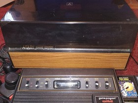 Atari 2600 W Games Paddles Joy Sticks And Game Center  For Parts