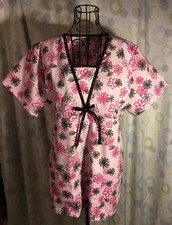 Green Town brand woman's nursing scrub top. Pink with flowers. Size XS