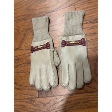 Vintage Chanel leather and knit gloves featuring a decorative buckle