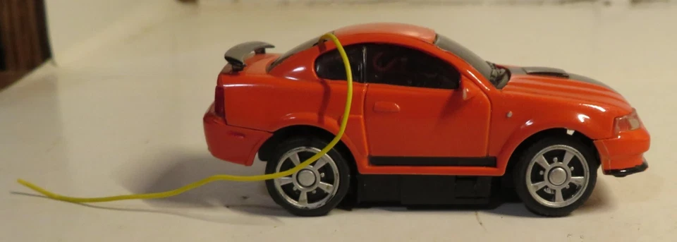 Ford Mustang Radio Shack Control Remoto Coche de Carreras Naranja Negro 3" Largo Suelto Juguete Sin Probar Foto 2 de 4