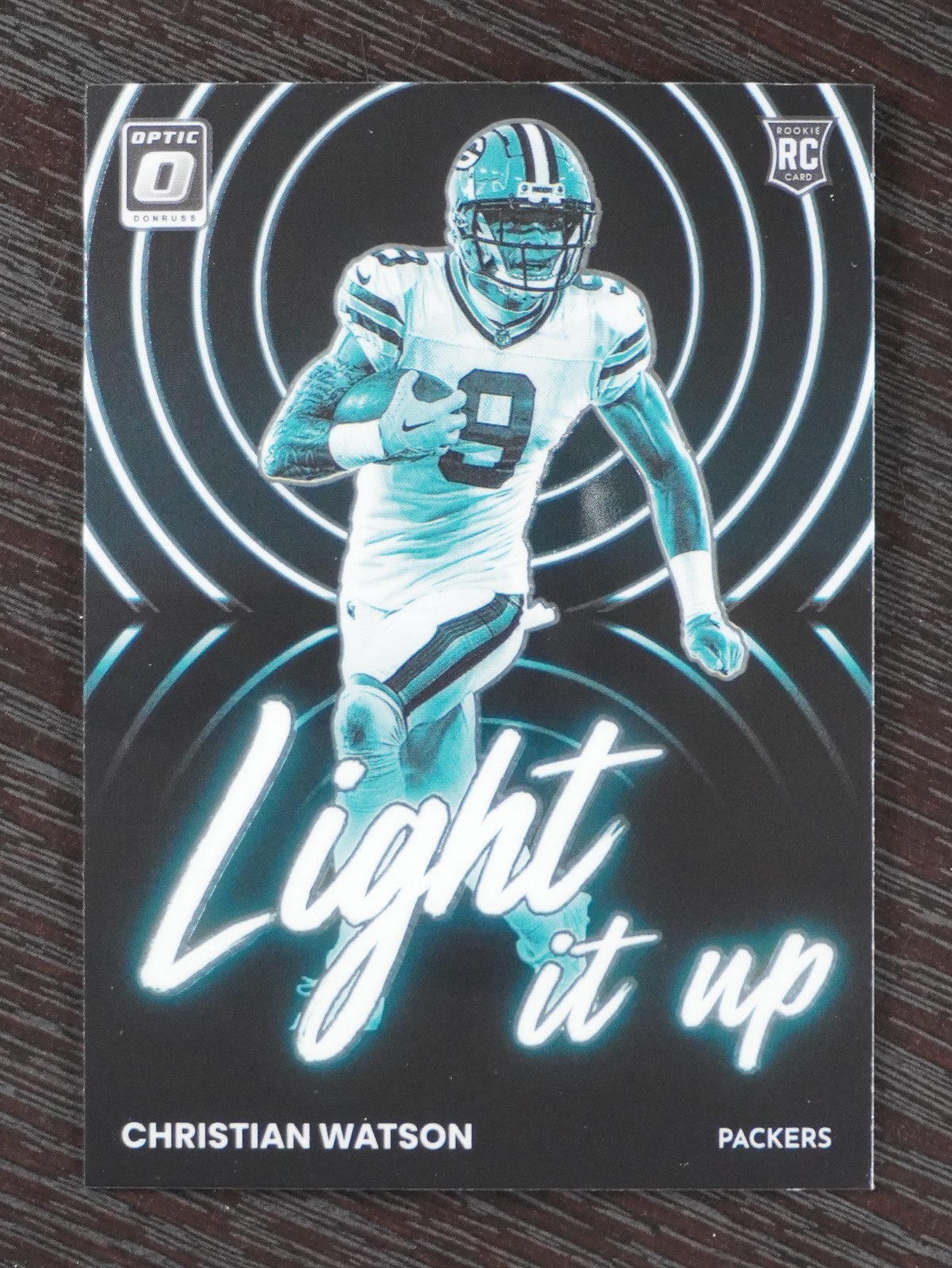 2022 Donruss Optic #LU-17 Christian Watson Light it Up RC Rookie Packers