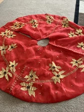 Vintage red tree skirt with gold poinsettias beaded and sequin