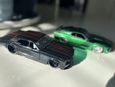 Jada lot of 2 Muscle green 1970 Ford Mustang Boss  1965 black ford mustang