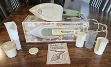1960s Vintage  Steam Stress No Metal Wrinkle Remover.