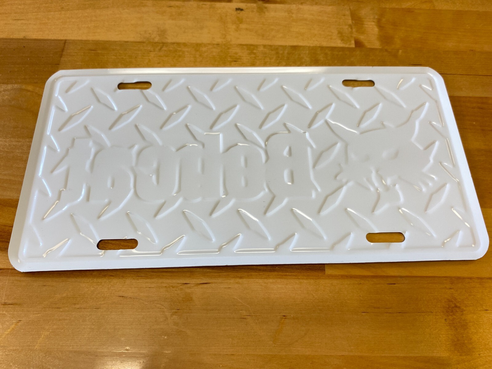 NEW METAL LICENSE PLATE W/ BOBCAT LOGO, DIAMOND PLATE PATTERN eBay