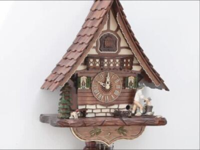 Kuckucksuhr Schwarzwaldhaus mit beweglichem Holzhacker KA 816 EX NEU