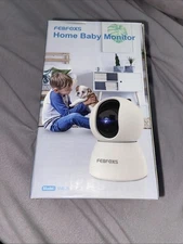 Febfoxs Baby Monitor with Camera  Color White Never Used Is Open.