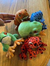 Aurora collectible sound frogs, plush, set of 4 in good condition, 4" tall