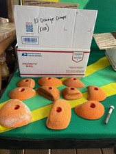 10 used rock climbing crimps holds, orange