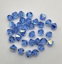 Swarovski Crystal Light Sapphire AB Bicone Beads; 4mm 24pc or 6mm 12pc 