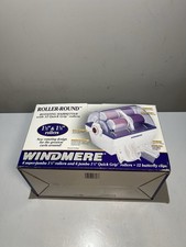 Windmere Roller-Round rotating hairsetter features 12 Quick Grip rollers. OpenB