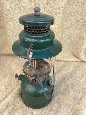 VINTAGE COLEMAN 242C  lantern green over brass DATED 5/11