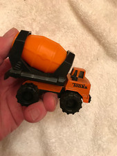 SMALL ORANGE AND BLACK TONKA CEMENT MIXER