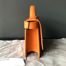 Borse e borsette da donna arancione in pelle con tasche esterne