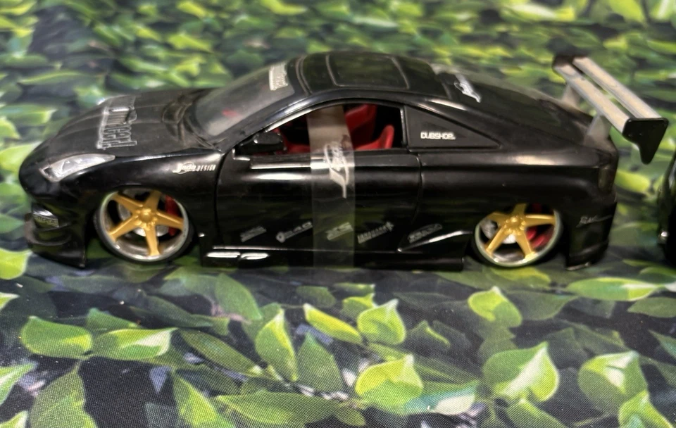 (2) Jada Toys Negro Toyota Supra Import Racer’s Escala 1:24 Die Cast|DubShop Foto 2 de 4