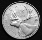1961 25¢ silver VF coin in a paper flip