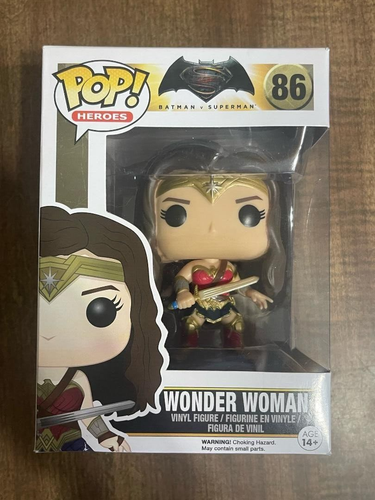 Three Wonder Woman Pop Vinyl Figures: #86, #86 WalMart Variant, #172 in red/gold armor.