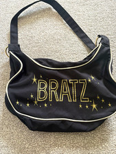 Black Y2K-style Bratz shoulder bag featuring gold glitter lettering.