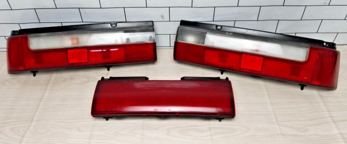 Suzuki Swift GTI Cultus Tail light Set JDM 220-32283 89-01 Genuine