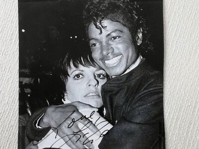 Liza Minnelli: Two original signatures. One print with Michael