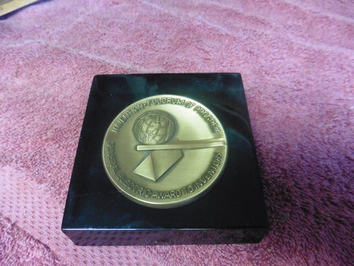 Acrylic Paperweight fulcrum GE award to Inventors Progress world conference