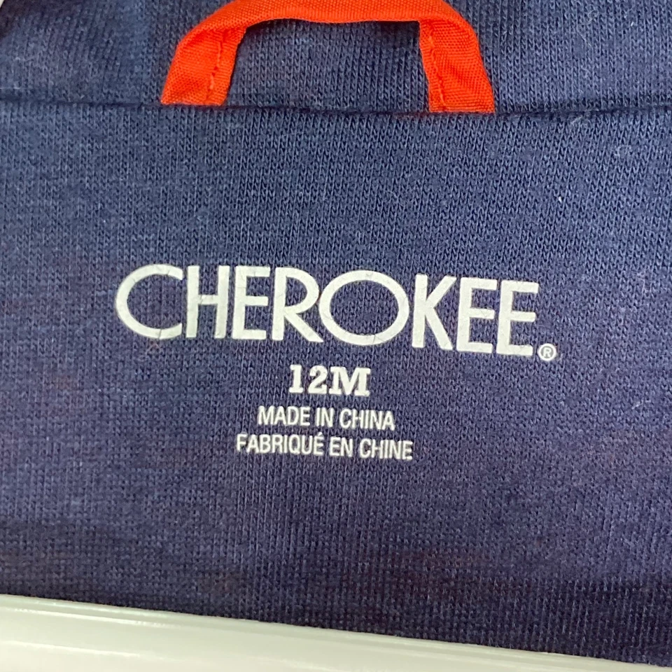 Chaqueta cortavientos con capucha naranja Cherokee para niños talla 12 meses Foto 3 de 4