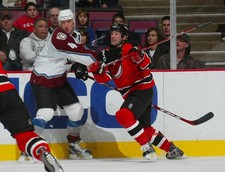 Jay Pandolfo New Jersey Devils is held up by Rob Blake Color- Ice Hockey Photo