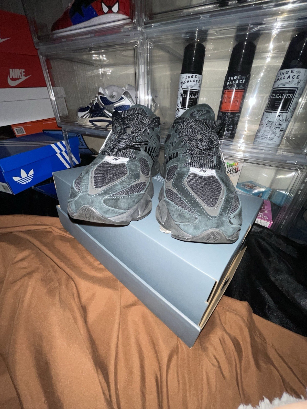 New Balance 9060 Men’s 8-13 Available, Triple Black.