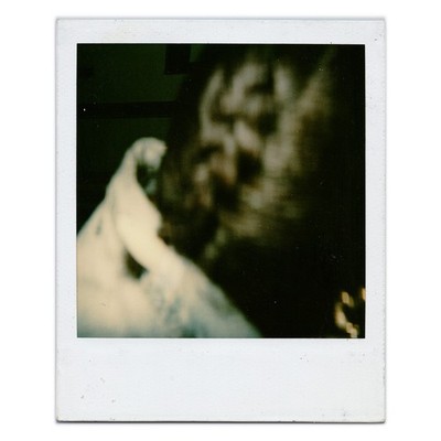 Photograph of Blurred Figure Portrait Closeup - 1970s Abstract Motion Polaroid