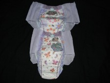 4 SAMPLE Huggies goodnight S/m size 43-68 Lbs made to fit 32 in waist.