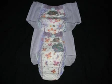 4 SAMPLE Huggies goodnight S/m size 43-68+ Lbs made to fit 32 in waist.