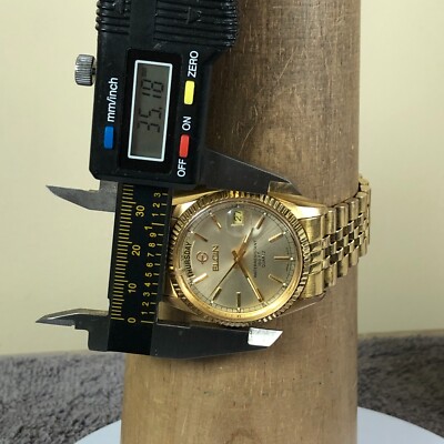 Elgin Men FC 400 Full Day/Date Presidential Gold Tone Fluted Elgin Men FC 400 Full Day/Date Presidential Gold Tone Fluted
