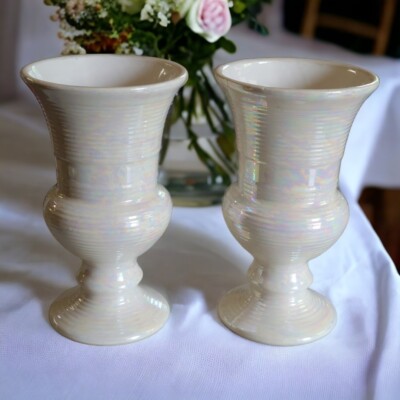 vintage hull vases. was used as a planter , rust stains inside, dirt on feet...