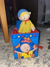 CAILLOU 2012 Hand Crank Metal JACK IN THE BOX Music Box Musical Toy PBS 