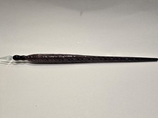 a beautiful, handcrafted glass dip pen featuring a striking marbled design