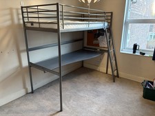 IKEA Svarta loft bed with desk, including Silent Night mattress.