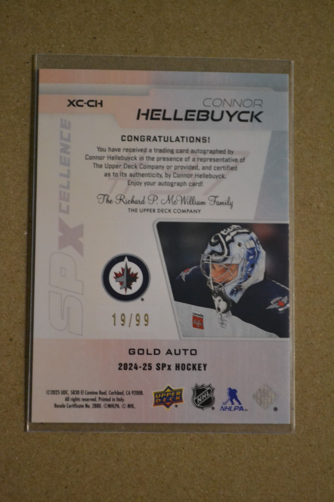 2024-25 SPx - SP Xcellence Gold Auto /99   Connor Hellebuyck #XC-CH