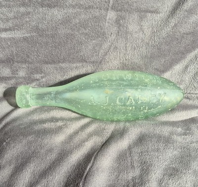 Antike A J Caley viktorianische grüne Glas Torpedoflasche Apotheke Norwich 1880er