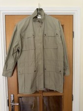 Ladies Safari Style Jacket With Checked Accents.